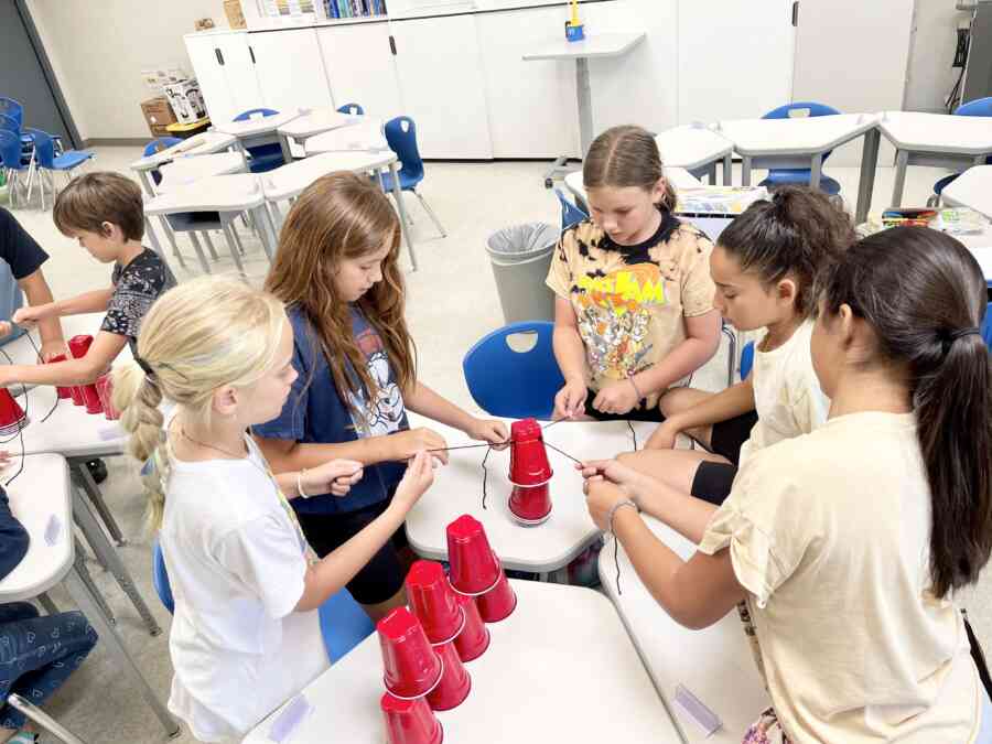 Some students at an elementary school participating in a summer expanded learning program